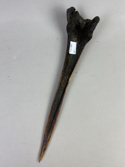 Antique fighting dagger made from a femur,...