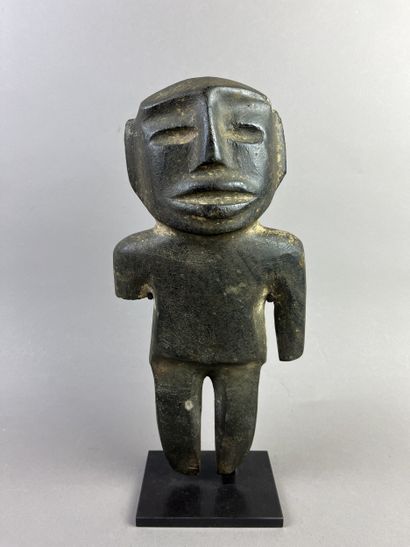 Anthropomorphic idol. Standing figure, arms...