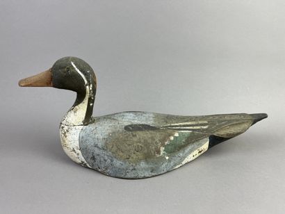 Antique wooden duck caller. Traces of polychromy....