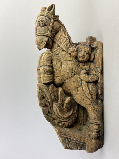 Protome of a horse accompanied by a musician....