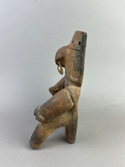 Cacique. Representation of a seated dignitary,...