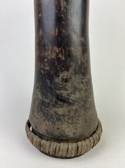 Hand drum (kundu) with flared ends and a...