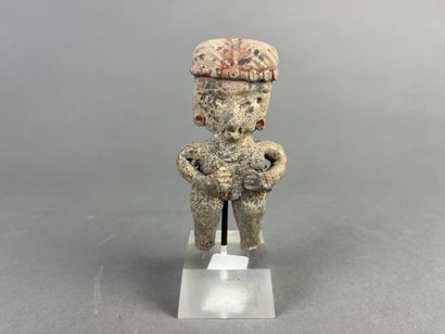 Standing female statue adorned with jewelry,...
