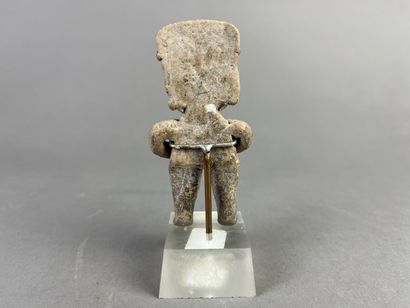 Standing female statue adorned with jewelry,...