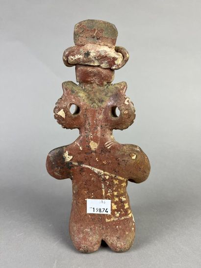 Seated figure, one knee on the ground, holding...