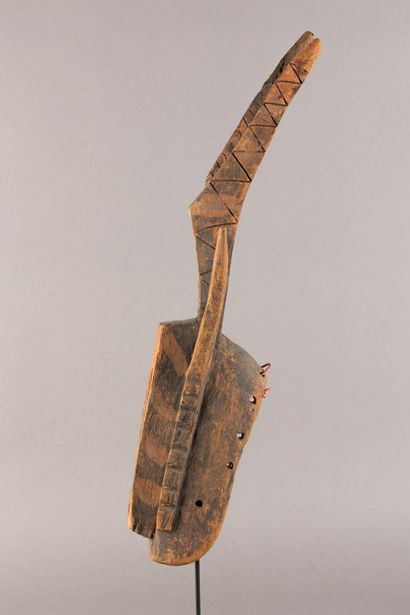 Wallu mask. The rectangular face is divided...