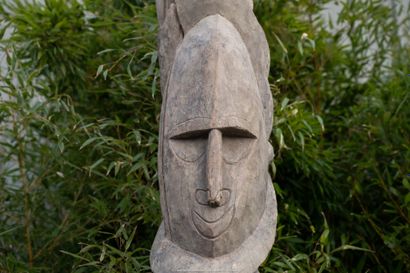 Important sculpture representing a male ancestor...