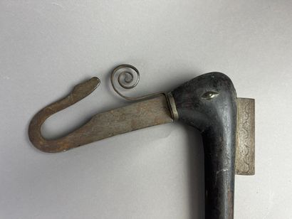 Two Recades, insignia of power. The blade...