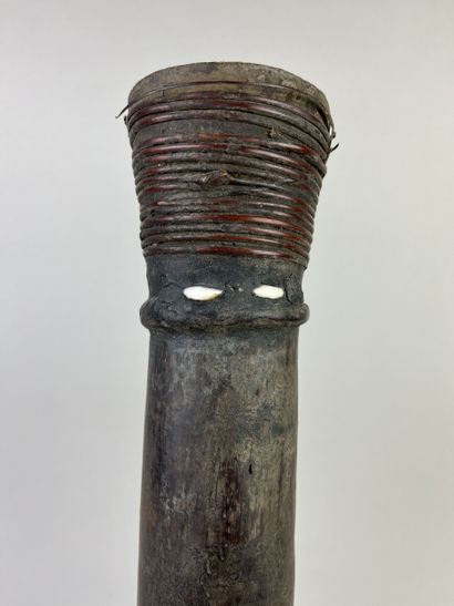 Hand drum (kundu) with flared ends and a...