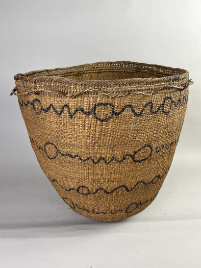 A large, ancient woven basket worn by shamans...