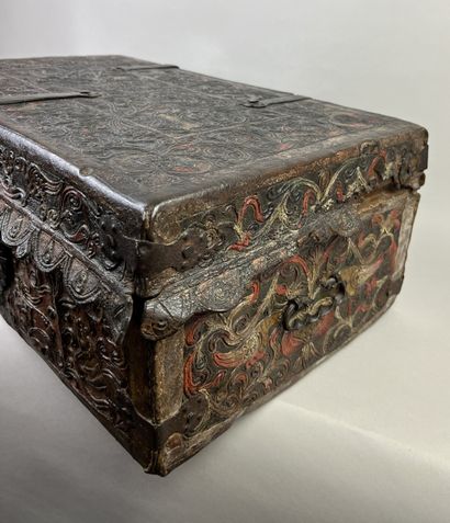 Wooden case covered with embossed, chased...
