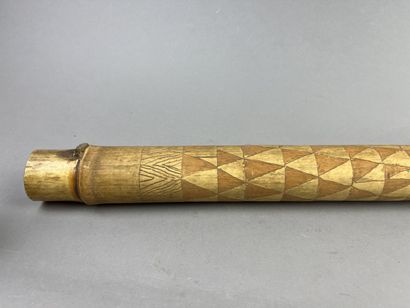 Two-hole bamboo flute decorated with geometric...