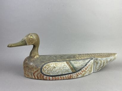 Antique wooden duck caller. Traces of polychromy....