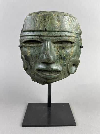 Human head from a large statue. The features...