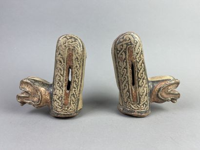 Two superb feet from a tripod bowl depicting...