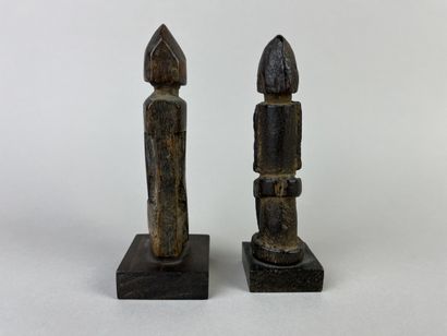 Two antique cubist-style small fetishes shown...