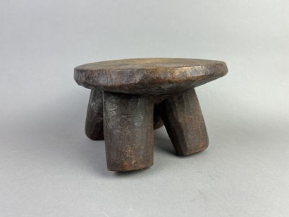 Small stool on four legs. Brown patina wood....
