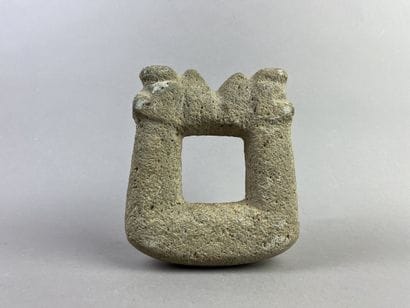 Metate pestle for grinding corn surmounted...