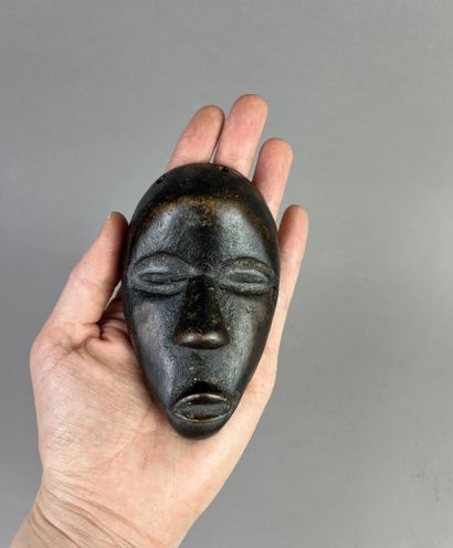 Passport mask. This miniature mask reproduces...