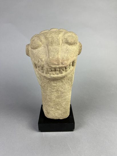 Feline head from an anthropo-zoomorphic deity....