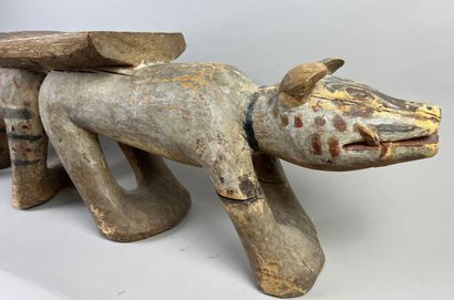 Seat composed of two animals side by side....