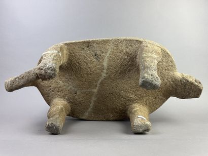 Metate. Corn grinding table in the shape...