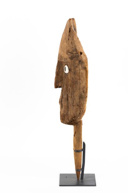 Funerary bundle mask. The face has a rather...