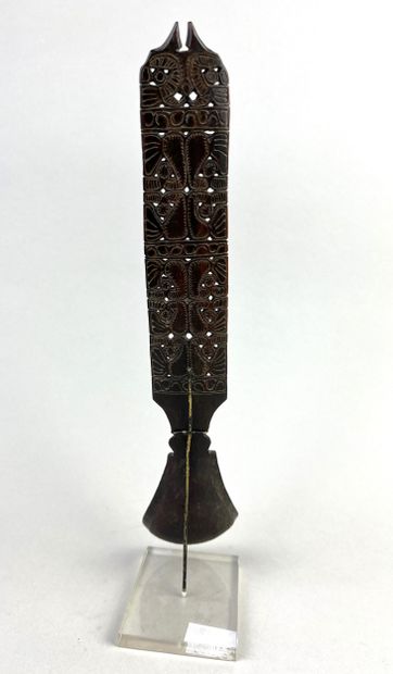Large spoon decorated with geometric motifs....