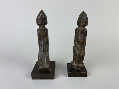 Two antique cubist-style small fetishes shown...