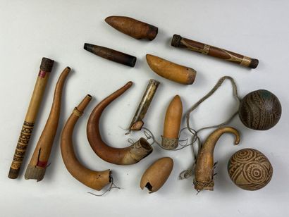 Lot comprising eight gourd and fiber penis...