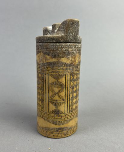 Two-hole bamboo flute decorated with geometric...