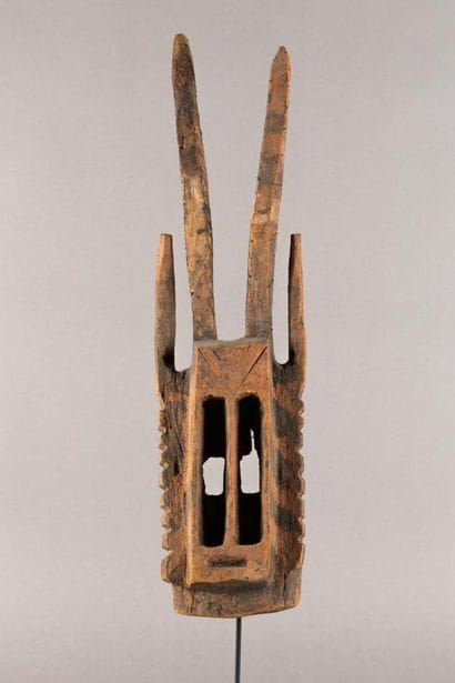 Wallu mask. The rectangular face is divided...