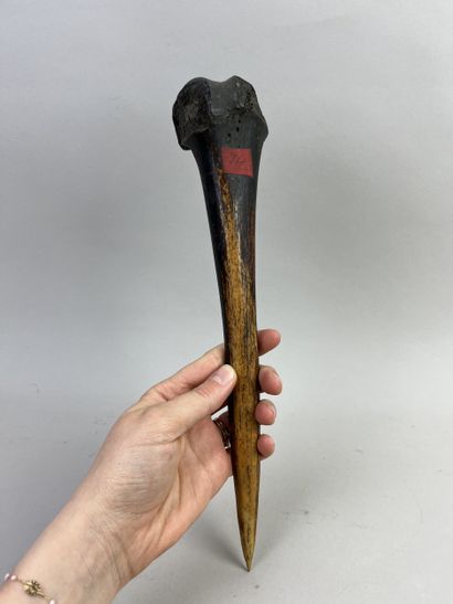 Antique fighting dagger made from a femur,...