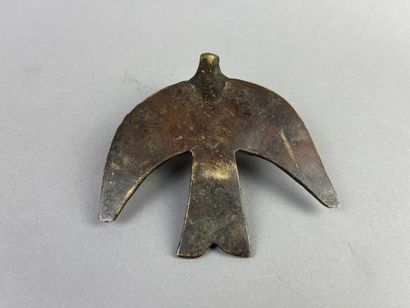 Crescent-shaped pendant featuring a large...