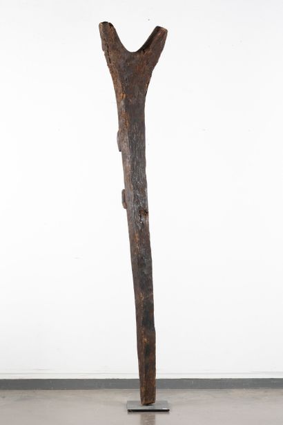 Toguna. Pillar carved in high relief with...