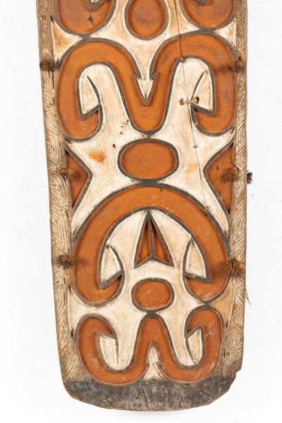 Large war shield surmounted by a representation...