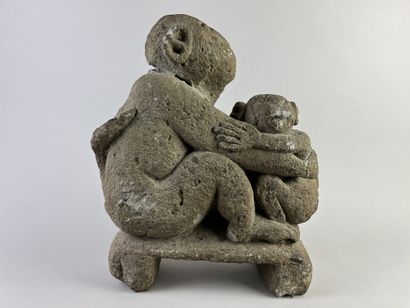 Sculpture depicting a simian figure holding...