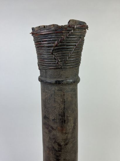 Hand drum (kundu) with flared ends and a...