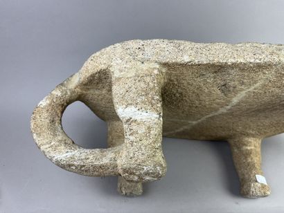Metate. Corn grinding table in the shape...