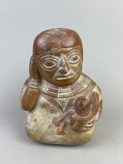 Vase representing maternity. The seated mother...