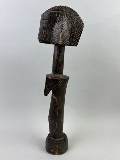 Fertility doll. Wood with brown patina. Height:...