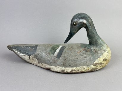 Antique wooden duck caller. Trace of polychromy...