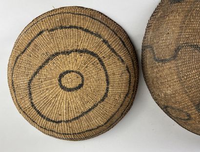 Two very old baskets for transporting and...
