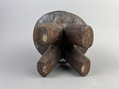 Small stool on four legs. Brown patina wood....