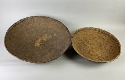 Two very old baskets for transporting and...