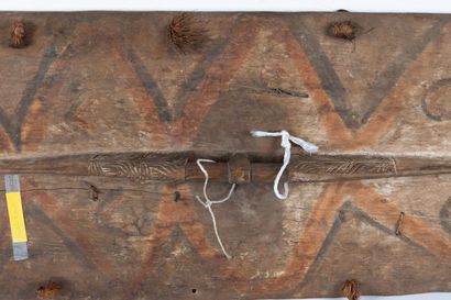 Large war shield surmounted by a representation...