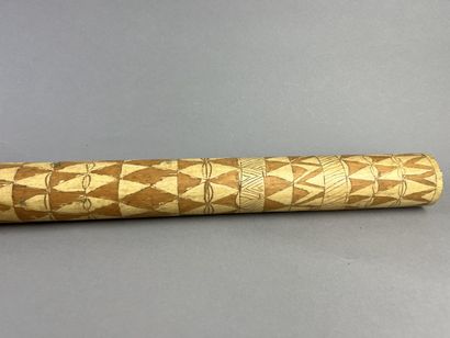 Two-hole bamboo flute decorated with geometric...