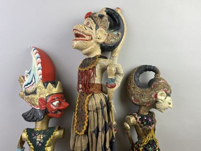 Three Wayang Golek rod puppets. The carved...