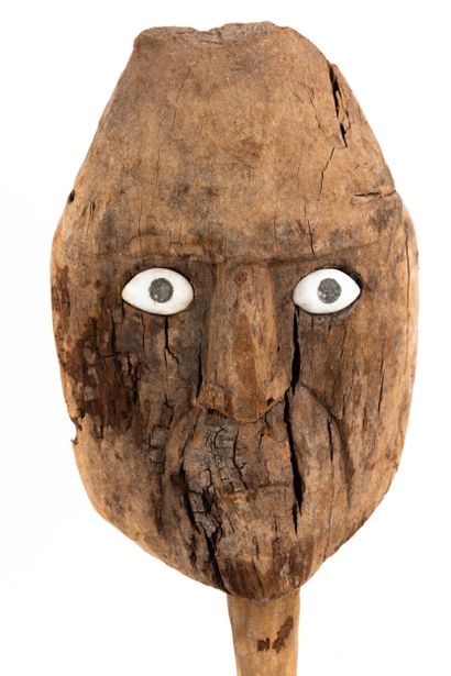 Funerary bundle mask. The face has a rather...