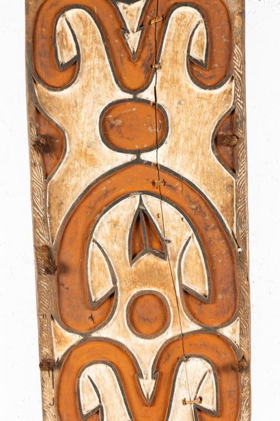 Large war shield surmounted by a representation...